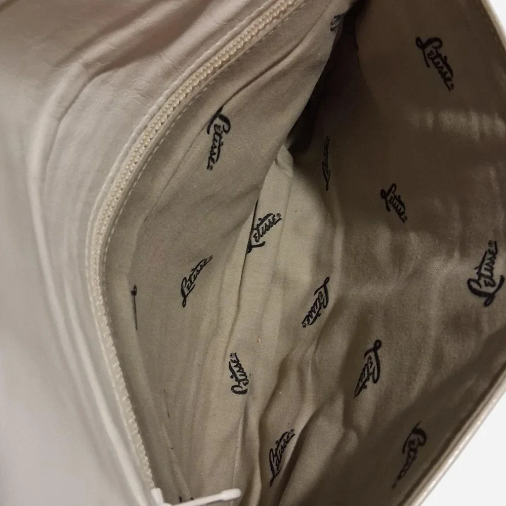 Womens 90s leather clutch bag with a boho vibe tan/cream